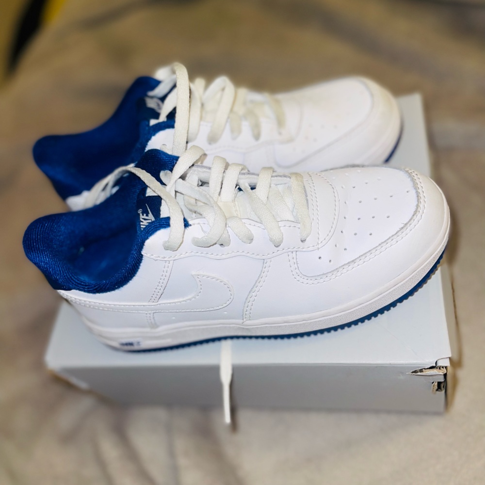 Blue & white Nike Air Force ones . Minimal dirt great condition Preschool size 1